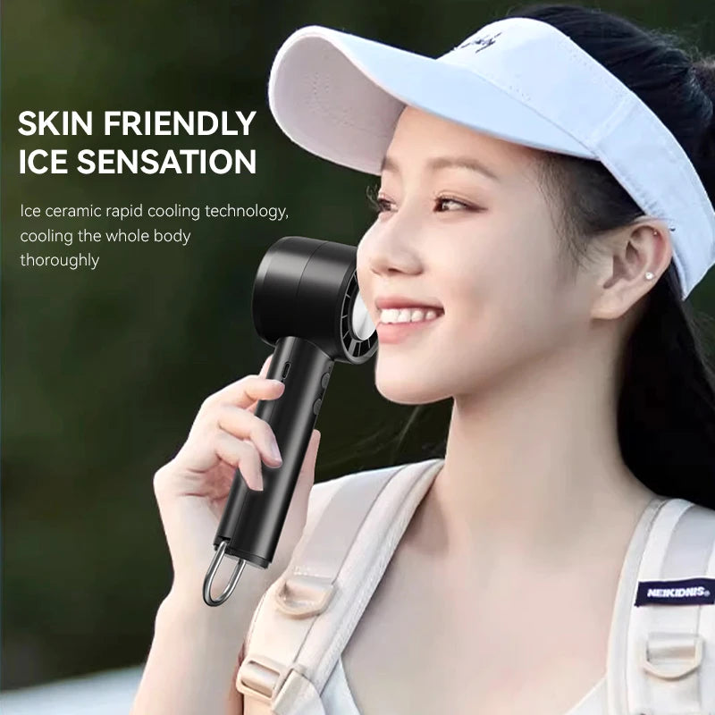 HomeSpark Mini Handheld Cooling Fan – USB Rechargeable, 3‑Speed Air Cooler